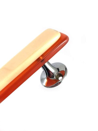 Vintage lucite door handle in cream and orange