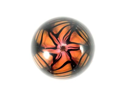 orange and black glass vintage paperweight