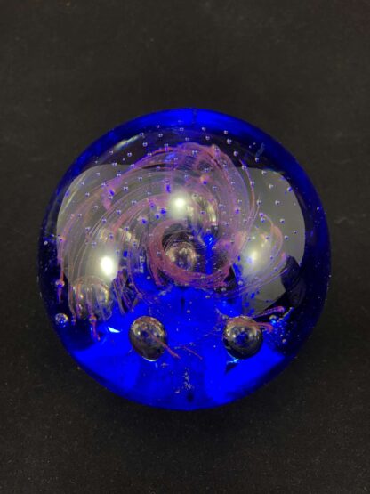 Blue and pink glass paperweight