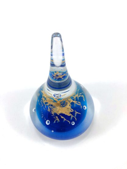 blue and gold glass paperweight