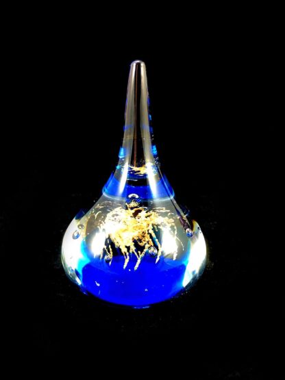 blue and gold glass paperweight