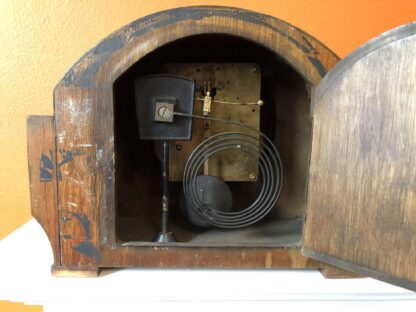 Antique chiming mantel clock with pendulum
