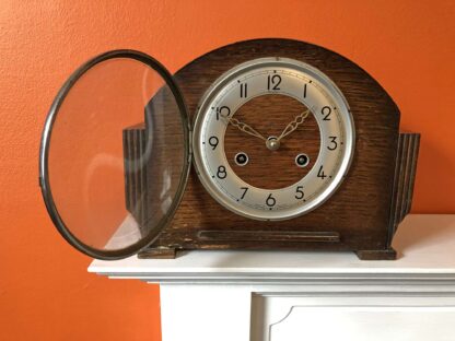 Antique chiming mantel clock with pendulum