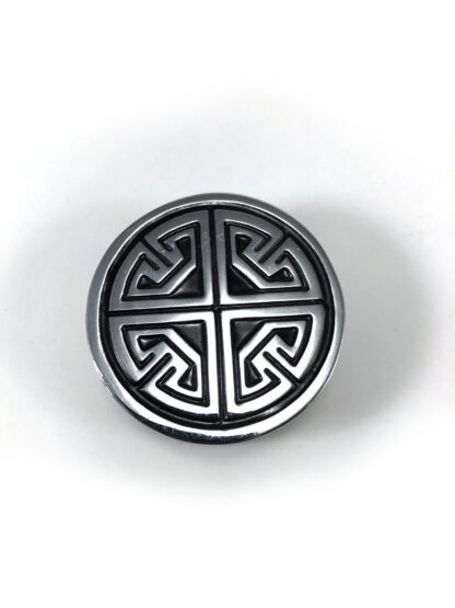 Polished pewter paperweight with Celtic design