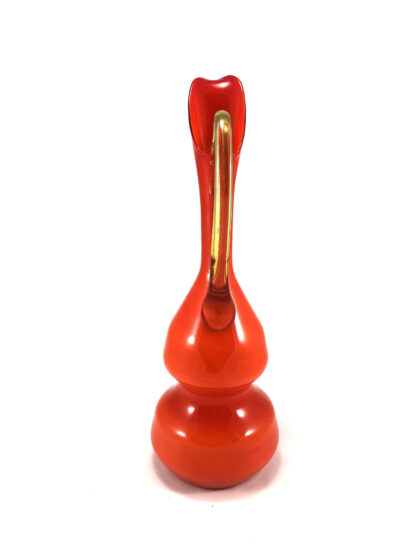 Orange glass vase with yellow handle